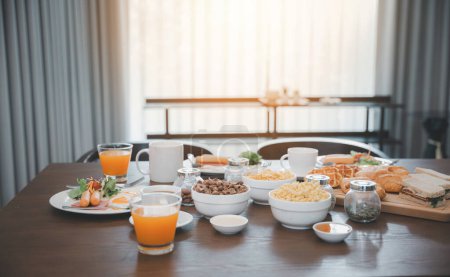 Photo for Fresh and bright continental breakfast healthy, Breakfast served food with beverage coffee, orange juice on table in the morning at home - Royalty Free Image