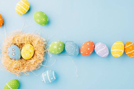Photo for Top view holiday banner background web design white easter eggs in brown nest on white cement background with empty copy space, celebration greeting card, overhead, template, Happy Easter Day Concept - Royalty Free Image