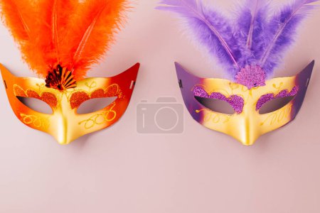 Photo for Happy Purim carnival. Carnival mask for Mardi Gras celebration isolated on purple background banner design with copy space, jewish holiday, Purim in Hebrew holiday carnival ball, Venetian mask - Royalty Free Image