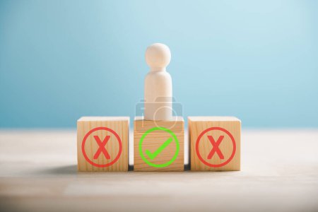 Photo for People stand on wooden block indicating right and wrong contemplating yes or no. True and false symbols depict business choices. Decision-making concept on wood. Think With Yes Or No Choice. - Royalty Free Image