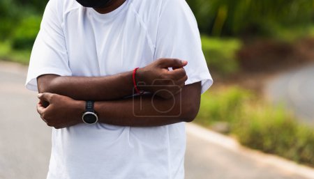 Photo for Close up Asian young sport runner black man wear watch he having elbow pain and use hands joint hold elbow while exercising at the outdoor street health park, healthy exercise Injury from workout - Royalty Free Image