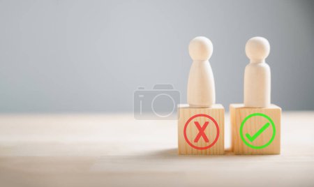 Photo for Decision concept, people use wood to showcase right and wrong pondering yes or no. Business options represented with true and false symbols. Think With Yes Or No Choice. - Royalty Free Image