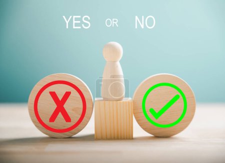 Photo for Peoples choice illustrated on wooden blocks between right and wrong pondering yes or no. True and false symbols portray business decision-making. Think With Yes Or No Choice. - Royalty Free Image