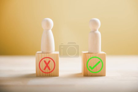 Photo for Decision-making concept, people use wood to display right and wrong pondering yes or no. Business dilemma indicated by true and false symbols. Think With Yes Or No Choice. - Royalty Free Image