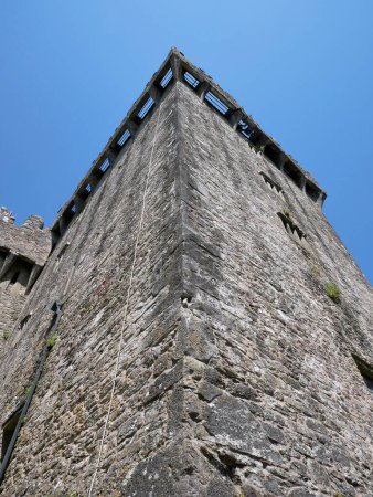 Photo for Old celtic castle tower over blue sky background, Blarney castle in Ireland, celtic fortress - Royalty Free Image