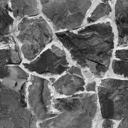 Téléchargez les photos : Modèle de pierre sans couture. Vieux mur en pierre texture monochrome noir et blanc - en image libre de droit