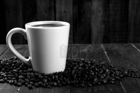 Photo for Coffee cup close vew black and white photo background, cup of tea or coffee on the table - Royalty Free Image