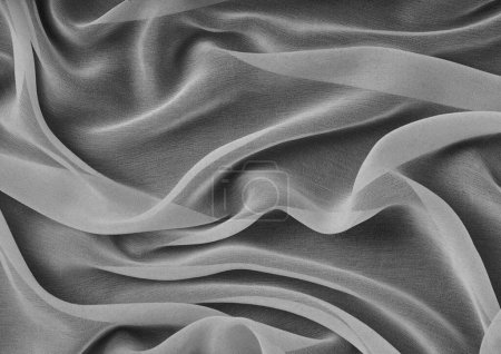 Modèle en tissu noir et blanc vue de près, fond de matière textile