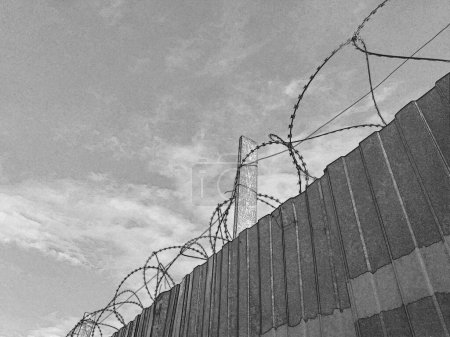 Barbed wire fence, prison and freedom conceptual background