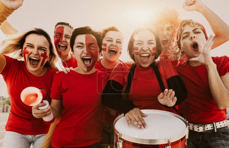 Photo for Women's football fans having fun cheering their favorite team - Soccer sport entertainment concept - Royalty Free Image