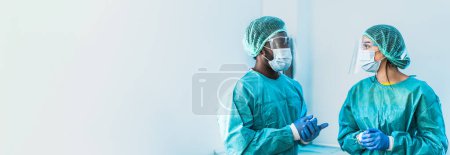 Photo for Multiracial surgeon team working inside the operating room - Healthcare and medical workers concept - Royalty Free Image