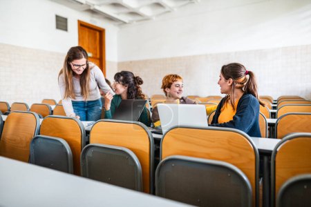 Photo for Young friends studying inside university classroom - School education concept - Royalty Free Image