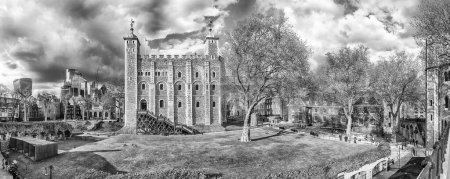 Photo for LONDON - APRIL 13, 2022: View over the inner courtyard with the White Tower, one of the main buildings inside the Tower of London, iconic Royal Palace and Fortress in England, UK - Royalty Free Image