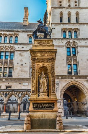 Photo for Temple Bar Memorial on the Strand, London, England, UK. The monument stands in front of the Royal Courts of Justice - Royalty Free Image