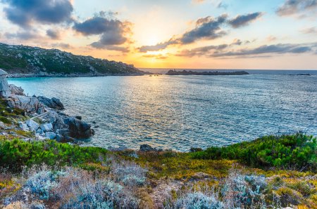 Photo for Scenic sunset over the sea among the beautiful granite rocks of Santa Teresa Gallura, northern Sardinia, Italy - Royalty Free Image
