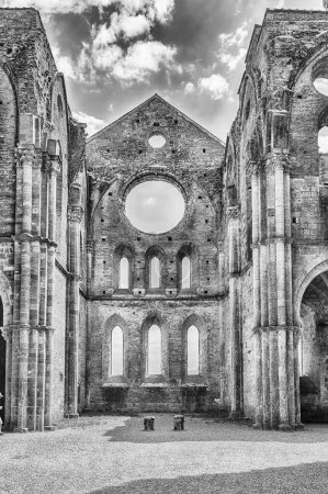 Photo for CHIUSDINO, ITALY - JUNE 22: Interior view of the iconic roofless Abbey of San Galgano, a Cistercian Monastery in the town of Chiusdino, province of Siena, Italy, on June 22, 2019 - Royalty Free Image