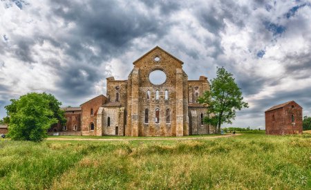 Photo for CHIUSDINO, ITALY - JUNE 22: Exterior view of the iconic Abbey of San Galgano, a Cistercian Monastery in the town of Chiusdino, in the province of Siena, Italy, on June 22, 2019 - Royalty Free Image