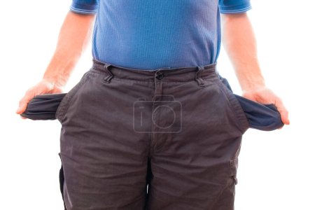 Photo for Bankrupt business man showing empty pockets hands - Royalty Free Image