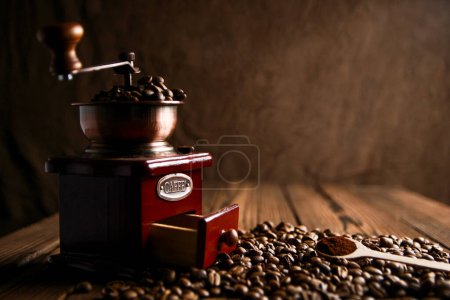Photo for Coffee grinder and coffee background - Royalty Free Image