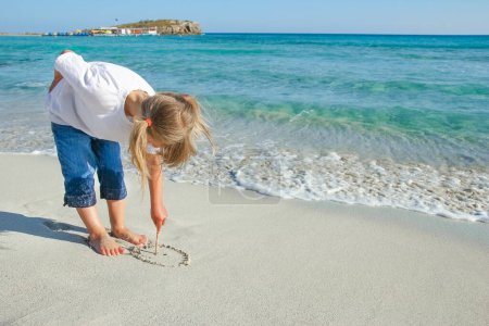 Photo for Happy child by the sea in the open air - Royalty Free Image