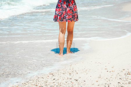 Photo for Feet and footprints by the seashore in nature travel vacation background - Royalty Free Image
