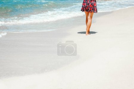 Photo for Feet and footprints by the seashore in nature travel vacation background - Royalty Free Image