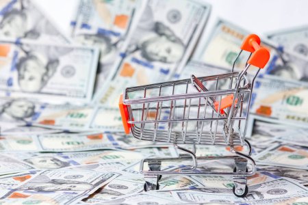 Photo for Dollars background shopping cart business concept bank in pandemic - Royalty Free Image