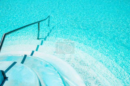 Photo for Beautifully stylish staircase steps in a swimming pool on nature sea background - Royalty Free Image