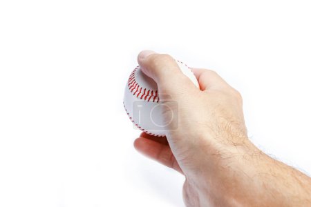 Foto de Hermosa en las manos de una pelota de béisbol sobre un fondo blanco myach - Imagen libre de derechos