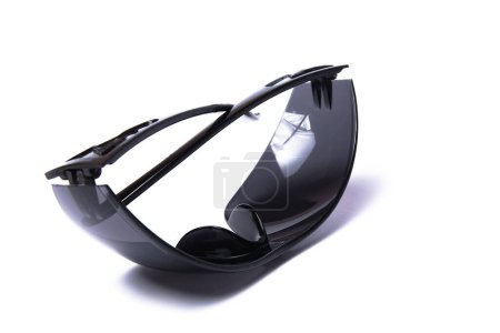 Foto de Gafas de sol elegantes sobre un fondo blanco - Imagen libre de derechos