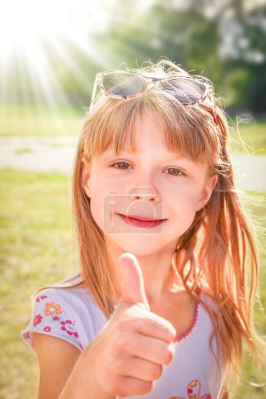 Photo for Girl happy in nature in the park - Royalty Free Image
