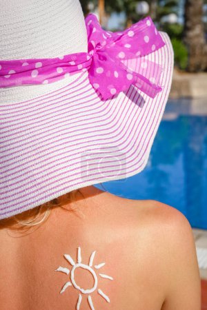 Photo for Happy girl with the sun on her back at the pool in the nature - Royalty Free Image
