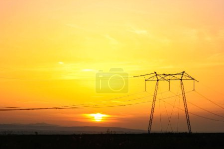 Photo for Electric wires on a pole danger of electric shock in nature - Royalty Free Image