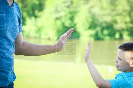 Photo for Hands parent and child walking concept family - Royalty Free Image
