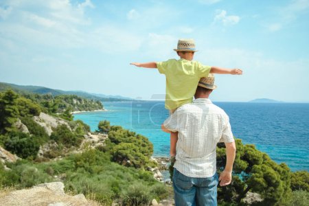 Photo for Hands of happy parents and children at sea in travel background in greece - Royalty Free Image