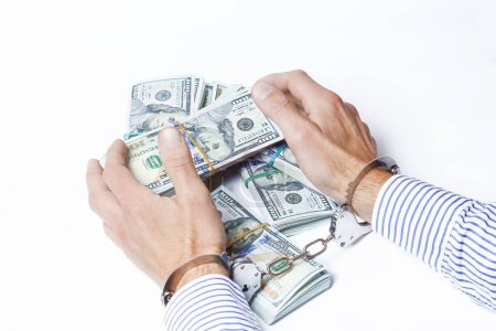 Foto de Dinero en las manos de un hombre de negocios concepto de préstamo sobre un fondo blanco - Imagen libre de derechos