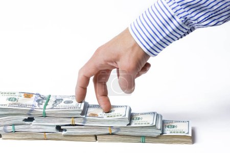 Foto de Dinero en las manos de un hombre de negocios concepto de préstamo sobre un fondo blanco - Imagen libre de derechos