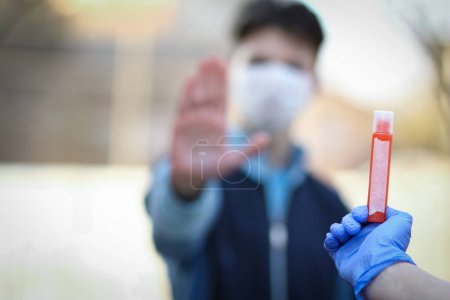 Photo for Coronavirus blood sample in hands 2019-2020. Crown virus outbreak. Epidemic viral respiratory syndrome. China - Royalty Free Image