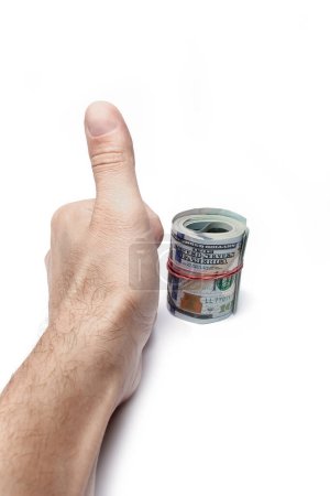 Téléchargez les photos : Argent dollars dans les mains sur un fond blanc - en image libre de droit