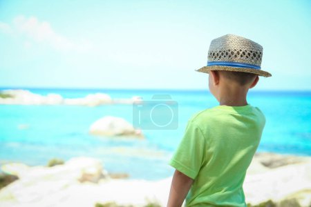 Photo for Happy child playing by the sea - Royalty Free Image