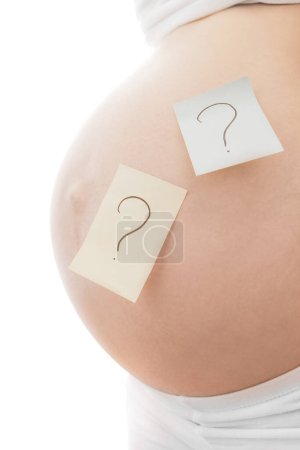 Foto de Chica embarazada sobre fondo blanco con pegatinas - Imagen libre de derechos