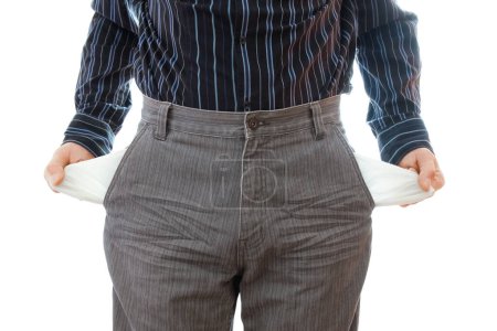 Foto de Hombre de negocios en bancarrota mostrando los bolsillos vacíos manos - Imagen libre de derechos