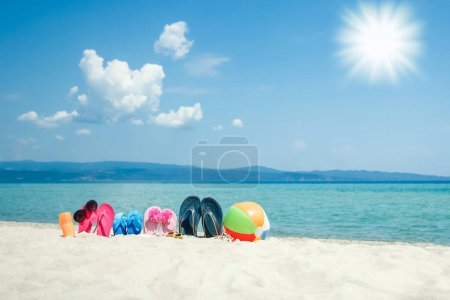 Photo for Beautiful slippers in the sand by the sea greece on nature background - Royalty Free Image