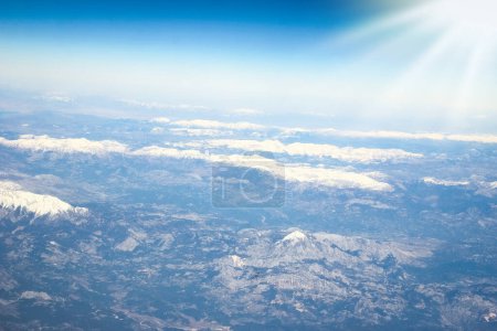 Photo for Beautiful earth and sea from a window airplane background - Royalty Free Image