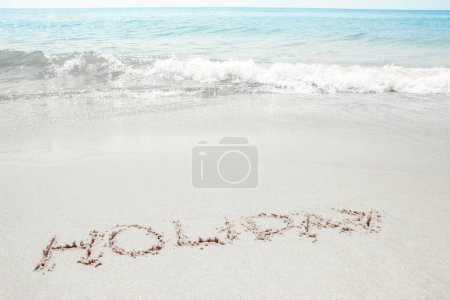 Photo for Beautiful drawings inscription on the sand of the sea in the summer on the nature - Royalty Free Image