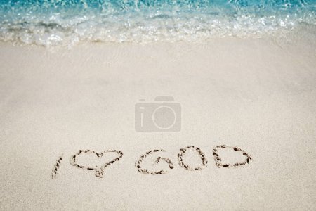 Photo for Beautiful drawing on the sand of the sea background - Royalty Free Image