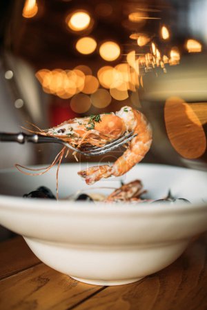 Photo for Cooked shrimp and seafood served at the restaurant - Royalty Free Image