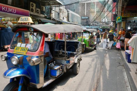 Photo for Tuk-Tuk taxis are very popular in Southeast Asia. On the streets of Bangkok. March 18, 2023 Bangkok, Thailand. - Royalty Free Image