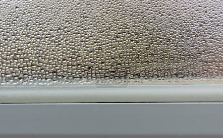 Photo for Condensation on Window after cold night can cause mold and health issues - Royalty Free Image