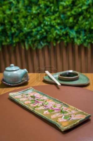 Photo for Delicious premium salmon sashimi arranged on an elegant handmade platter. - Royalty Free Image
